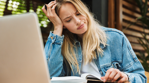 Woman confused by her notes