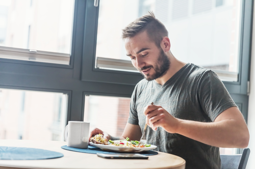 young man eating healthy